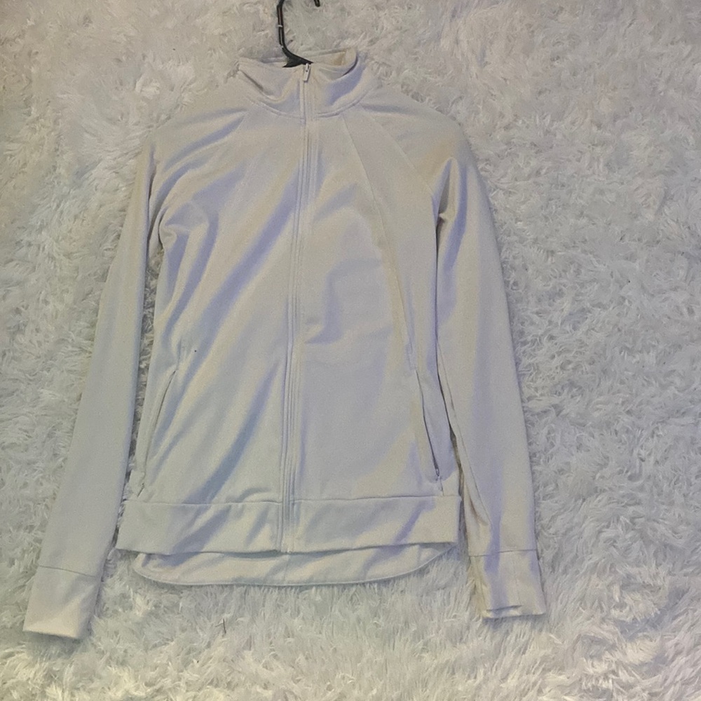Whit atheletic zip up, tight fitting